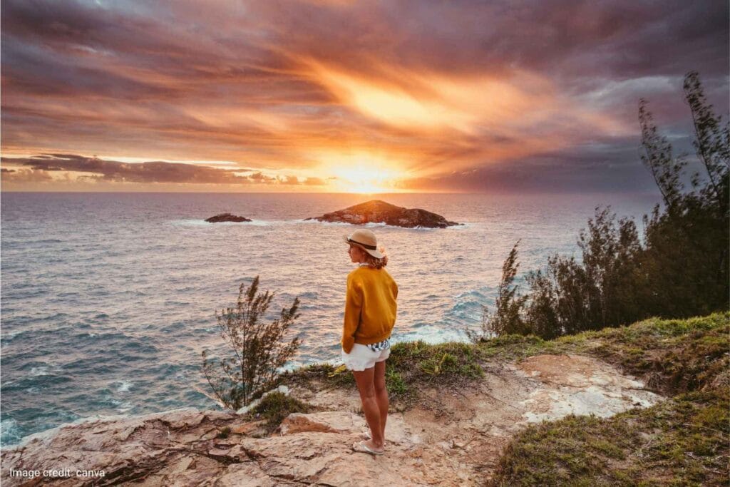 Woman experiencing sunset