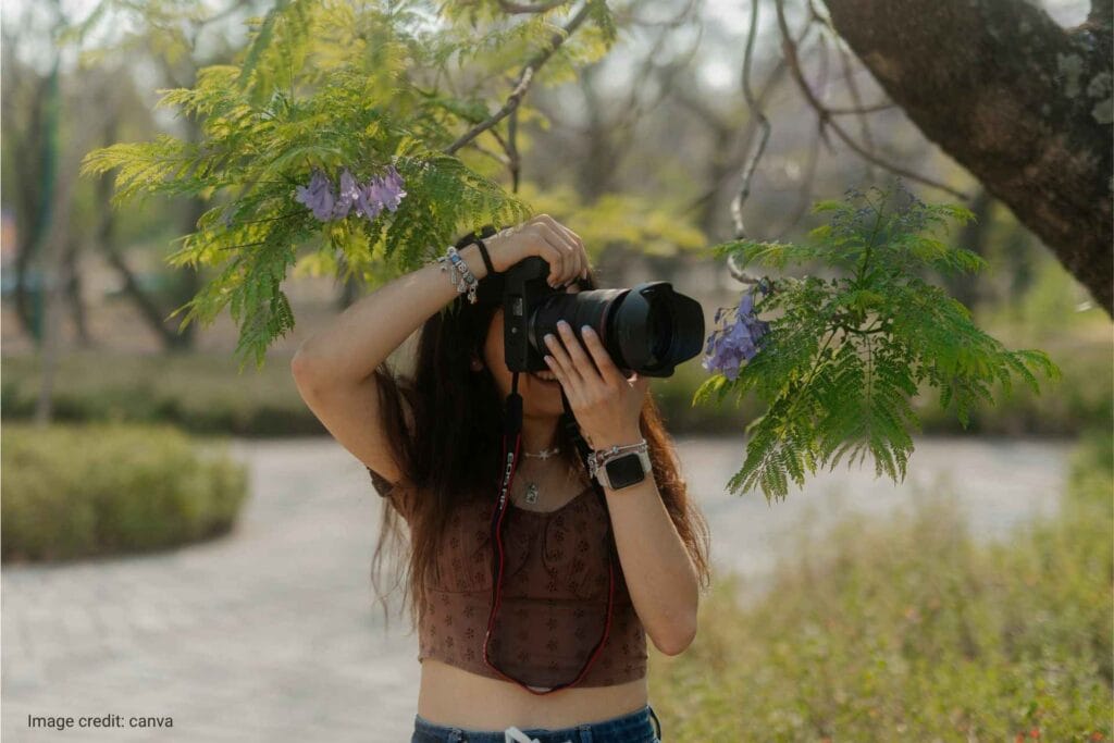 woman capturing nature as relaxing activity